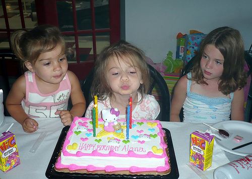 Alana blows out her candles