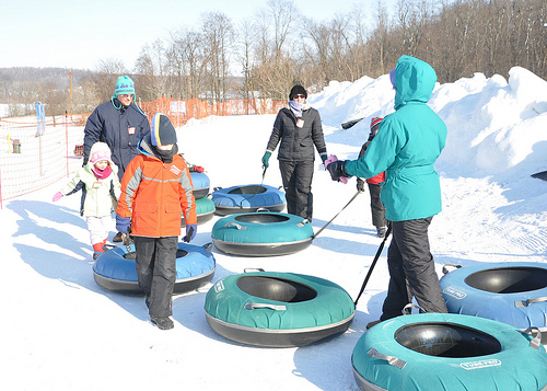 The Wilsons and the Homons after a Snow Tubing Run