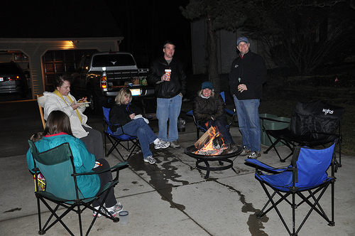 A warm January evening means a fire in the driveway