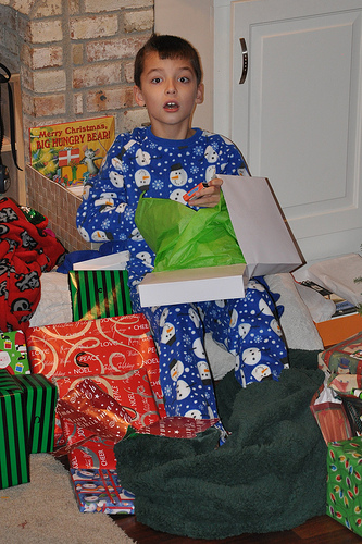 Carson Sits Atop a Throne of Gifts