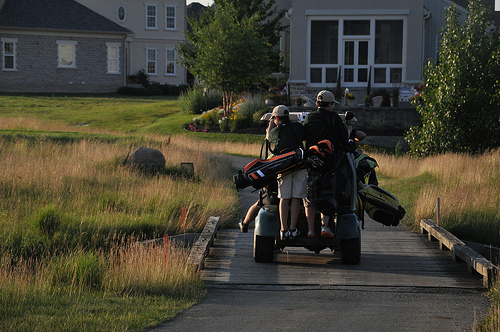 Catching a ride to the next tee