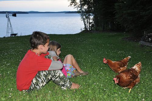 Carson and Alana with the chickens