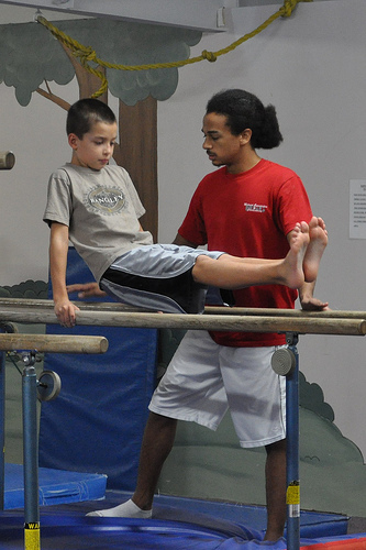 Carson on the parallel bars