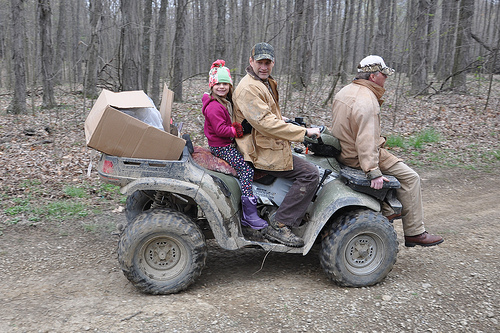 Alana, Mary, and Pat haul the seedlings to the planting grounds