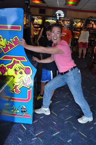 Julie demonstrates her Ms. Pac-Man prowess
